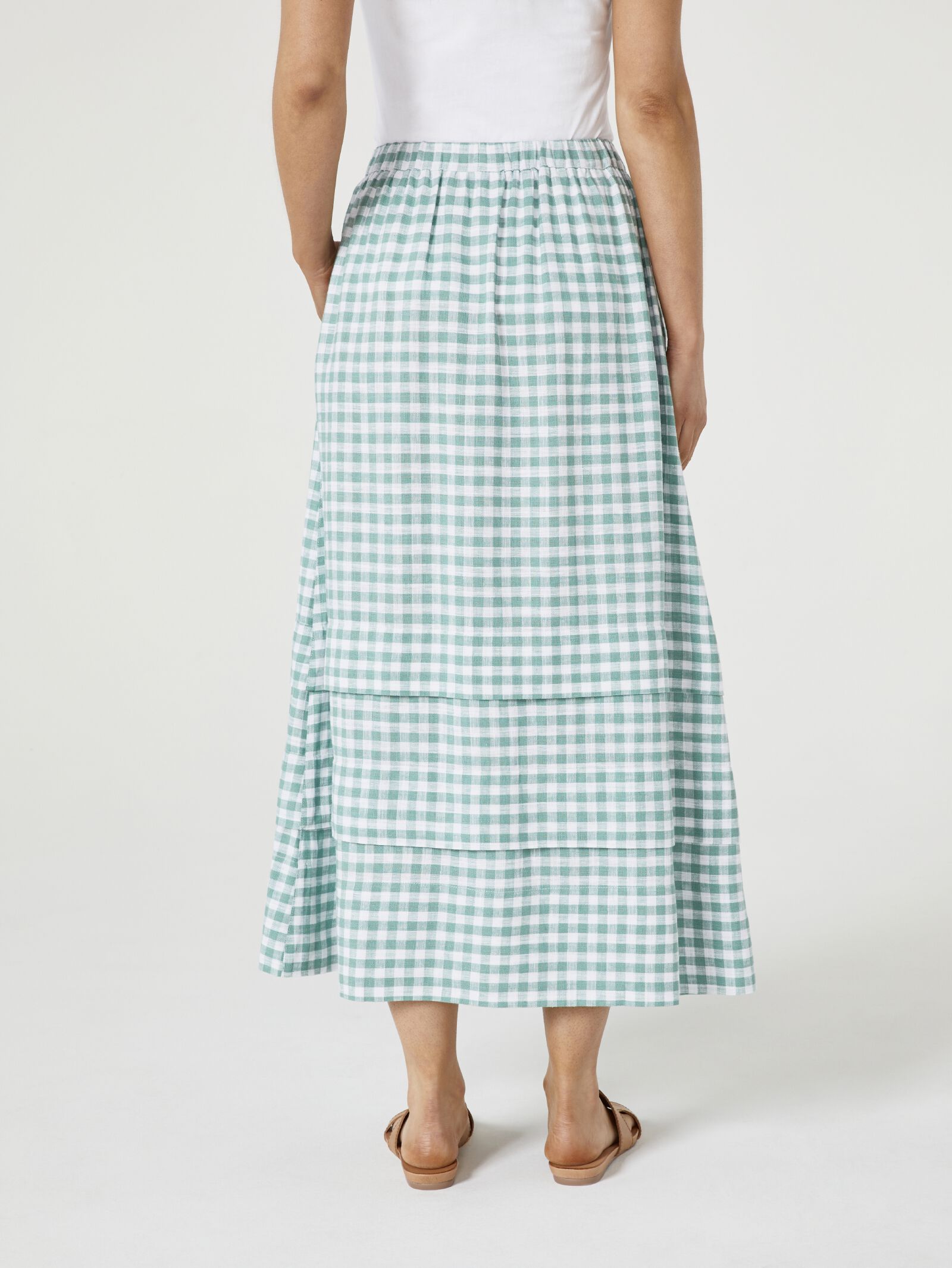 Green skirt the west top